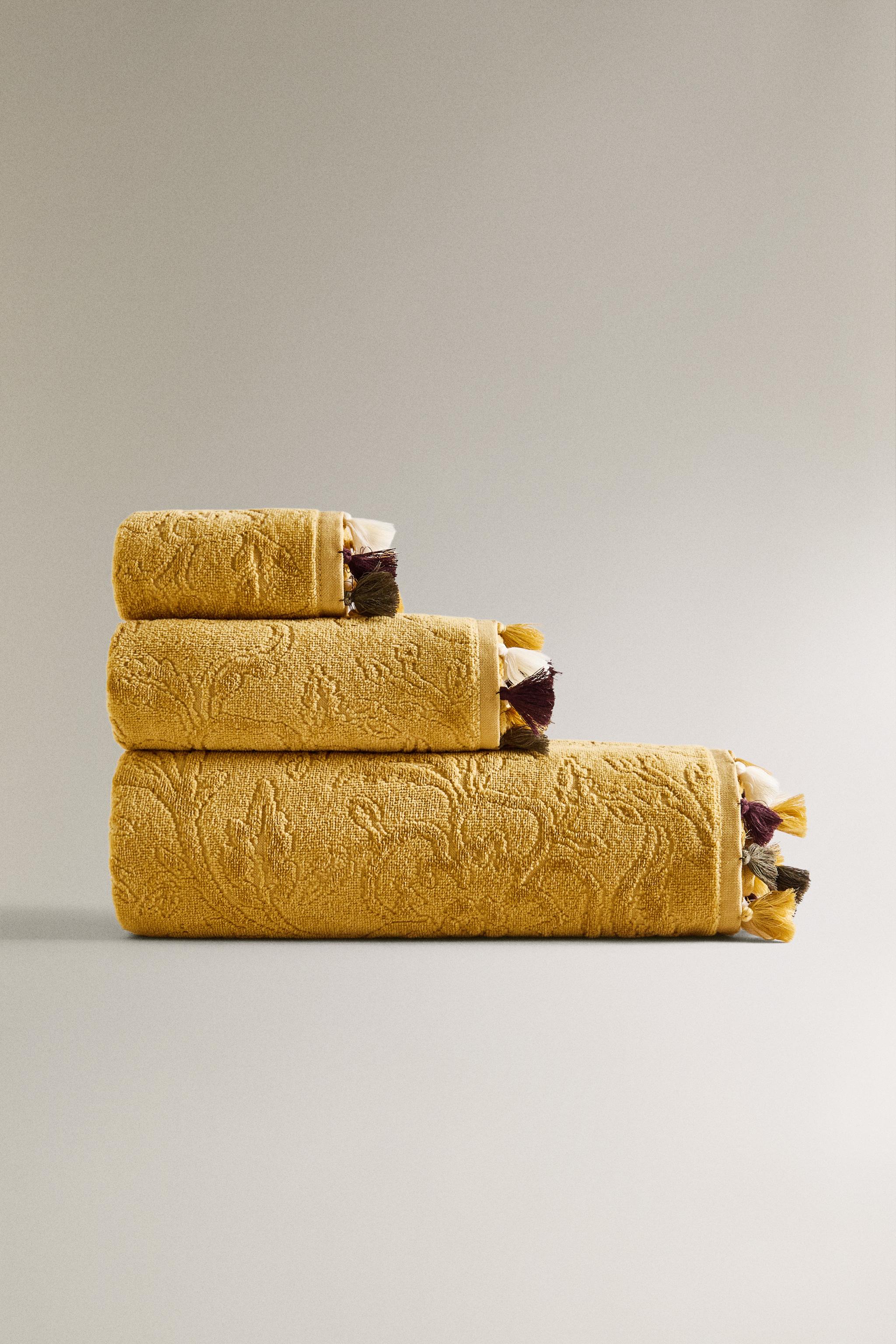 SERVIETTE DE BAIN POMPONS JACQUARD